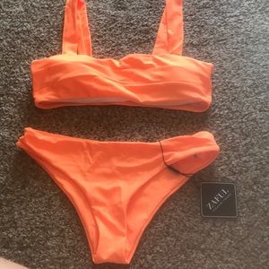 NWT neon orange swim suit